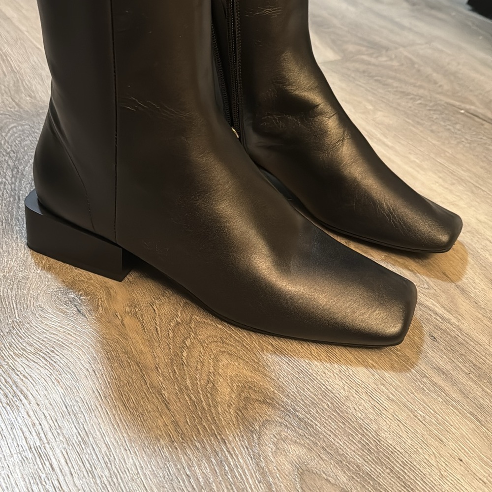 New ankle boots with tags